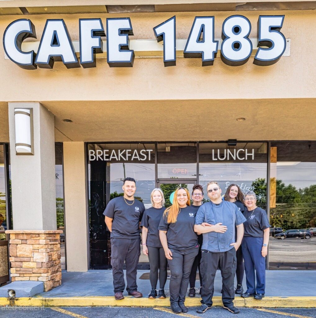 Cafe 1485 exterior shot with entire crew.