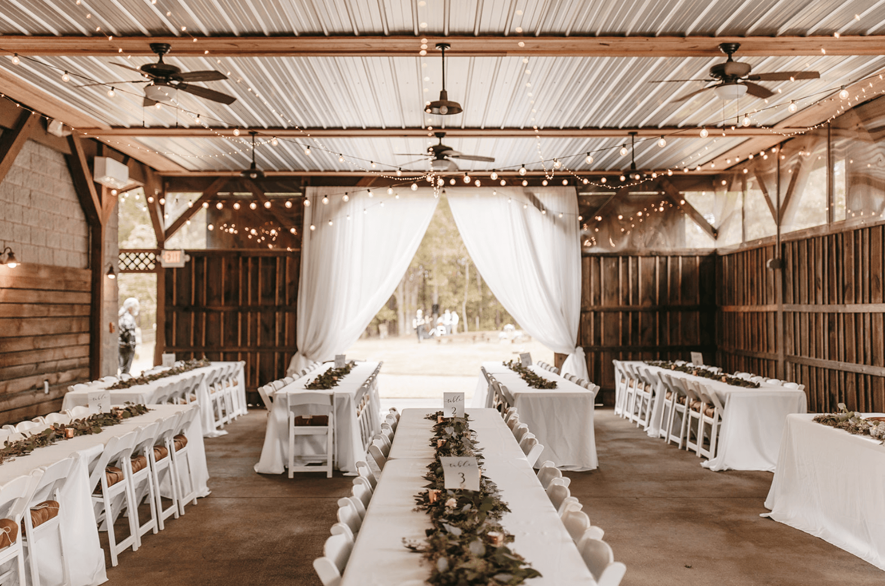 Interior shot of The Barn at Oak Manor decorated for a unique ceremony.